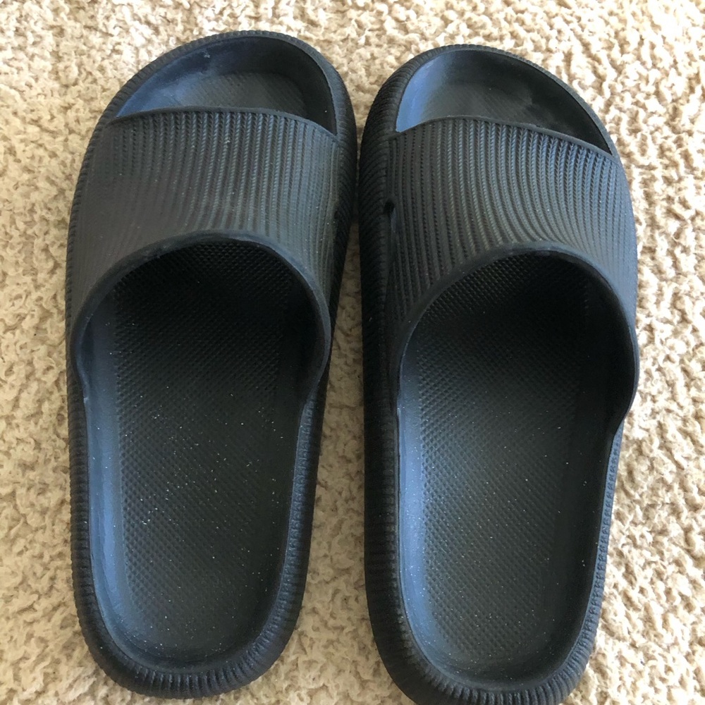 Plain black slides sandals.  Lightly used.